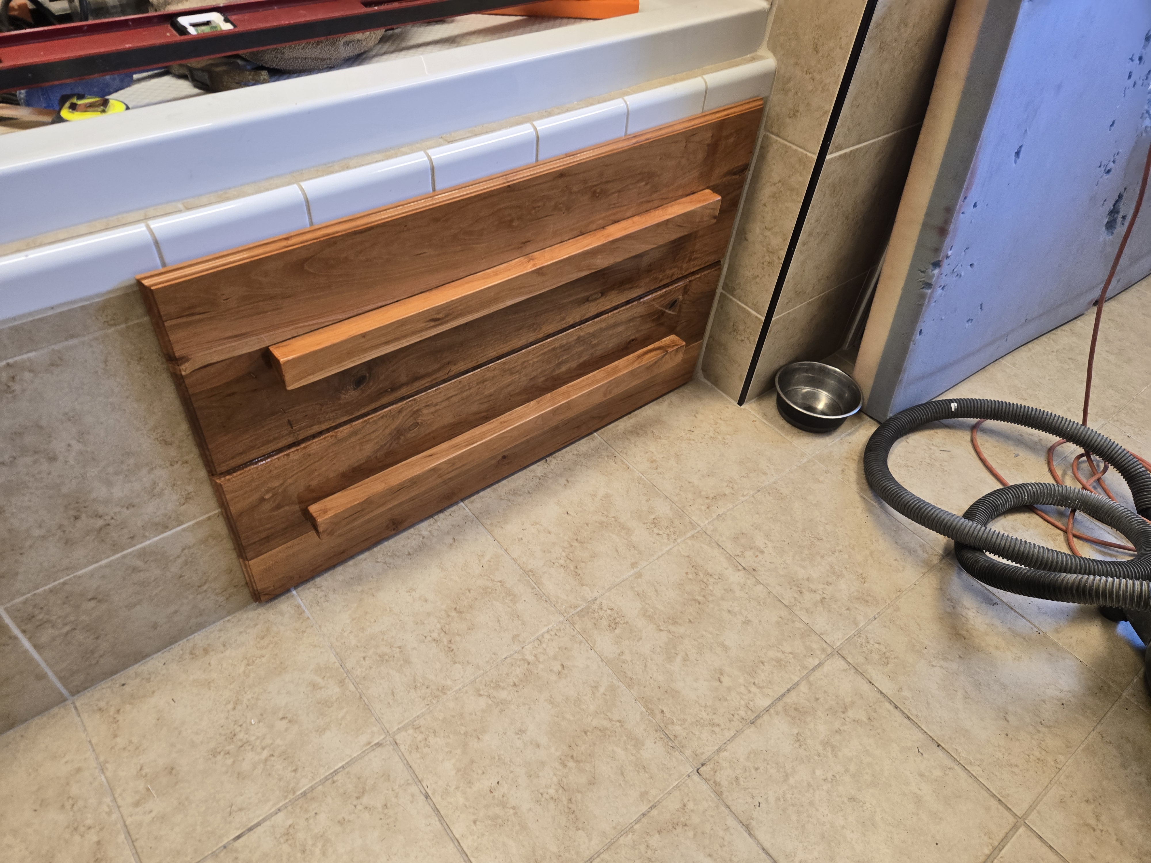 Cherry wood cabinets.